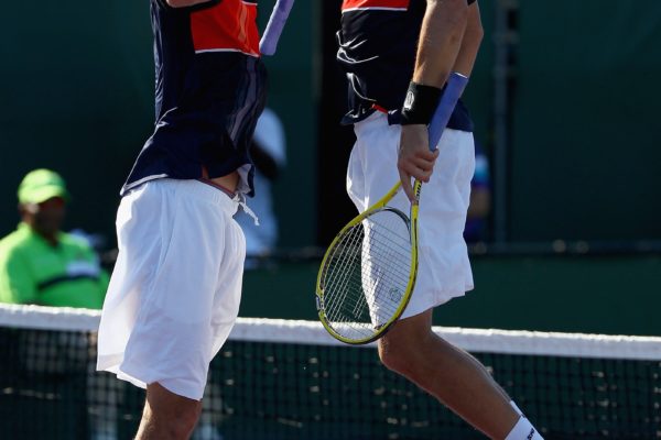 KEY BISCAYNE, FL - MARCH 24:  Bob and Mike Bryan celebrate match point against Bernard Tomic and Paul Hanley of Australia  in their first round doubles match at the Sony Ericsson Open at Crandon Park Tennis Center on March 24, 2012 in Key Biscayne, Florida.  (Photo by Clive Brunskill/Getty Images)